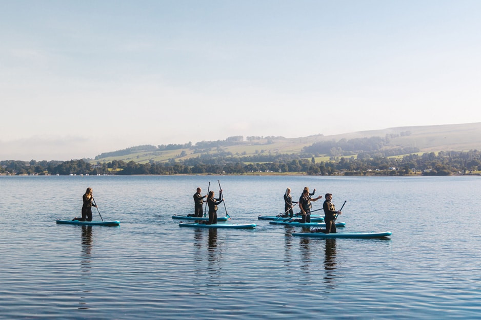 image of people paddle boarding