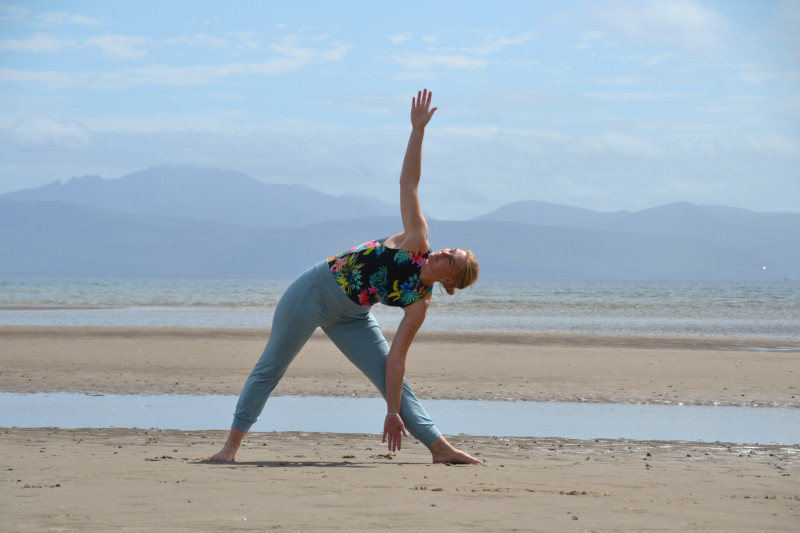 Laurie Bell yoga on the beach