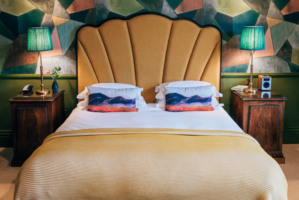 hotel suite bedroom interior design upholstered headboard 
