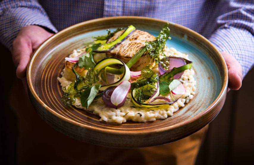brown butter poached hake spring vegetables and herb risotto 