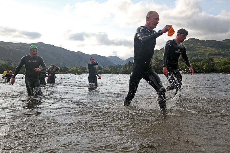 Helvelyn Triathlon 2012 swimmers emerge from ullswater icy water