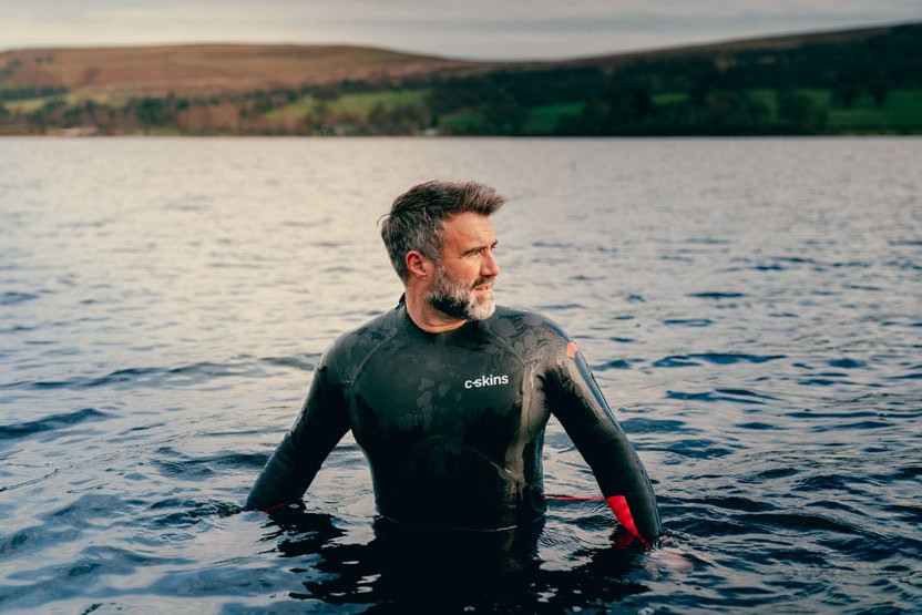 Man in water with wetsuit
