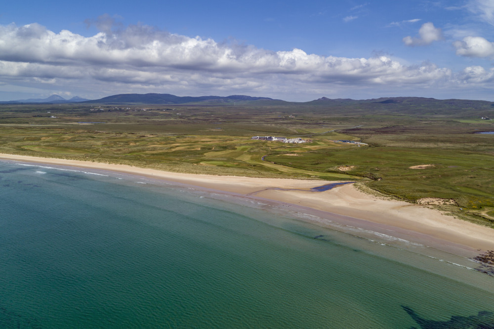 drone shot overlooking laggan bay and Another Place, The Machrie