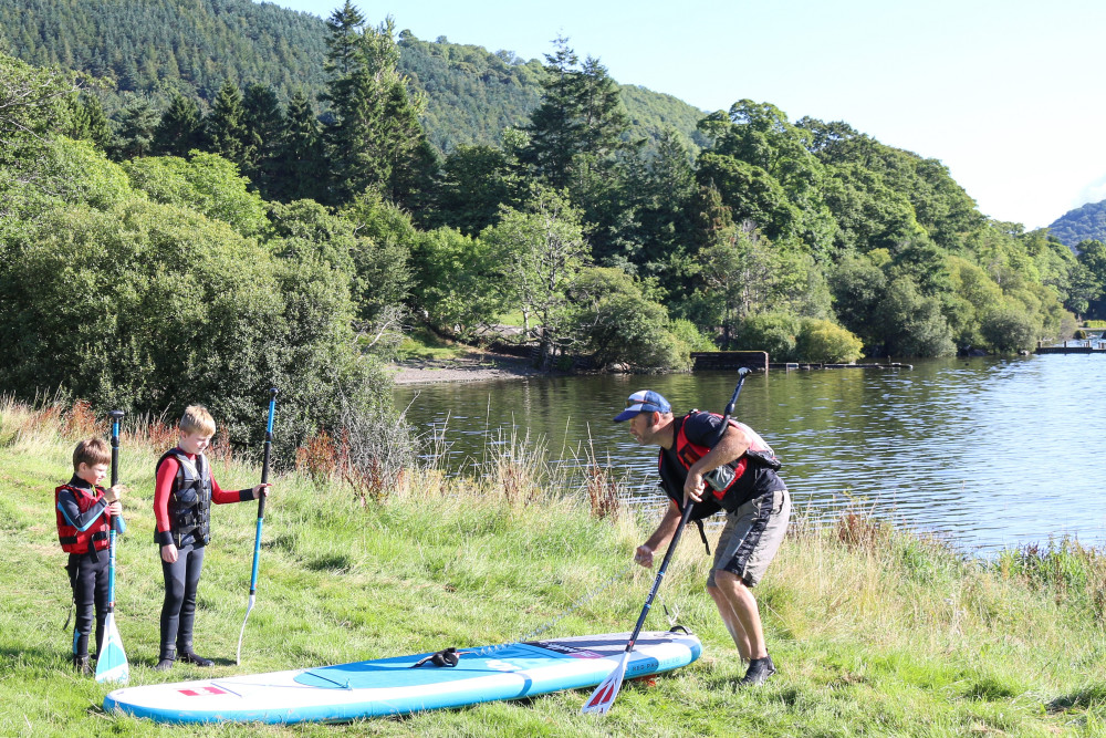Children learning to paddleboard