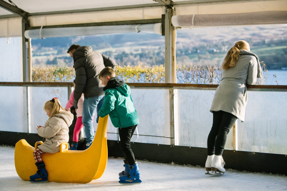 Children and parents enjoying rink and the view