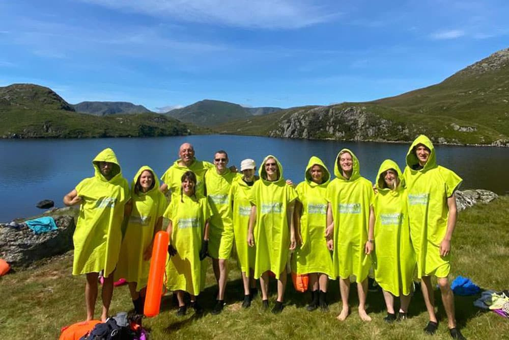 Group after swim in dry robes
