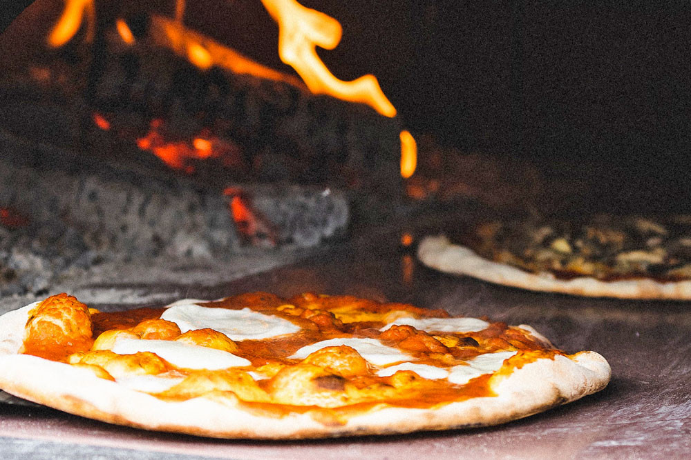 glasshouse pizza oven flames