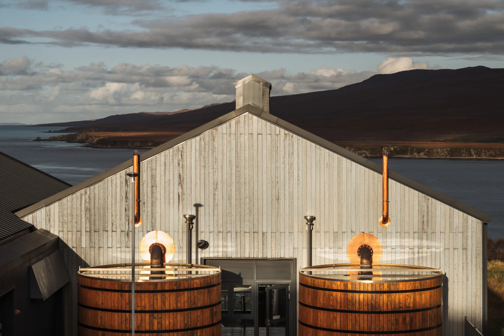 An exterior image of Ardnahoe distillery, two worm tubs in the foreground