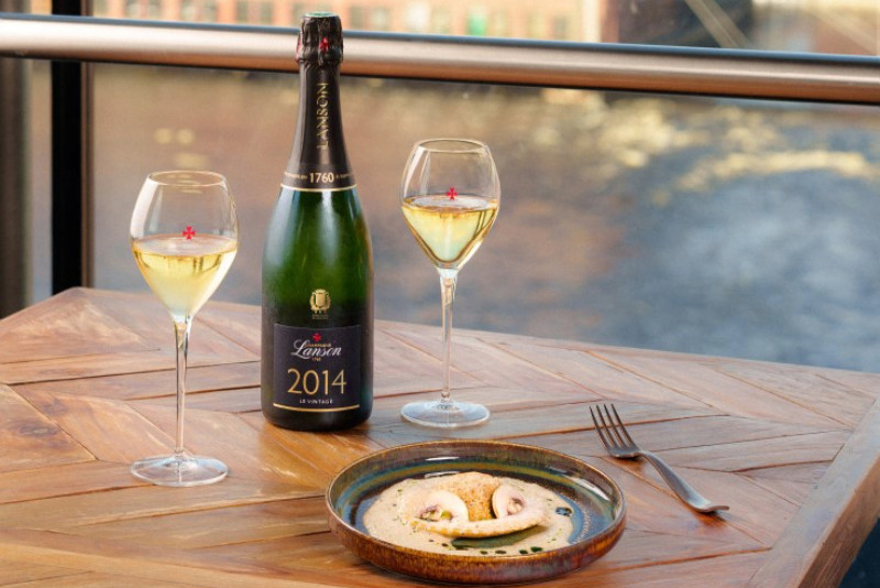 Champange Lason paired with food