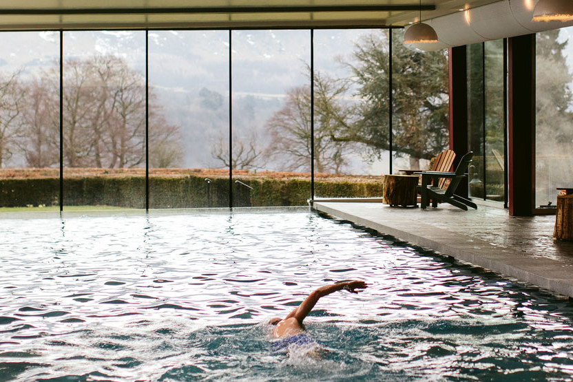 Person swimming in pool 
